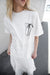 Oversized t-shirt with bow graphic in white — main image