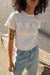 Rosette floral top in white — main image