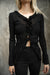 Ruffled v-neck long sleeve top in black — main image