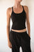 Padded racerback tank top in black — main image