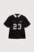 Graphic rugby polo shirt in black — main image