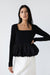 Bubble hem top in black — main image