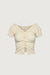 Ruffle halter top in ivory — main image