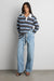 Collared contrast stripe polo shirt in blue stripe — main image