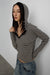 Hooded striped top with snap front detail in black stripe — main image