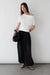 Boat neck top with shirred side detail in white — main image