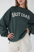 Oversized graphic sweatshirt in deep green e — main image