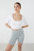 Cropped scoop neck tee in white — main image