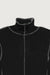 Exposed seams mockneck top in black — main image