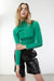Exposed seams mockneck top in green — main image