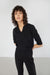 Collared knit top in black — main image