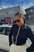 High neckline zip-up top in black — main image