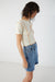 Exposed seam tee in cream — main image