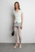 Layered lace top with twist front detail in blue — main image