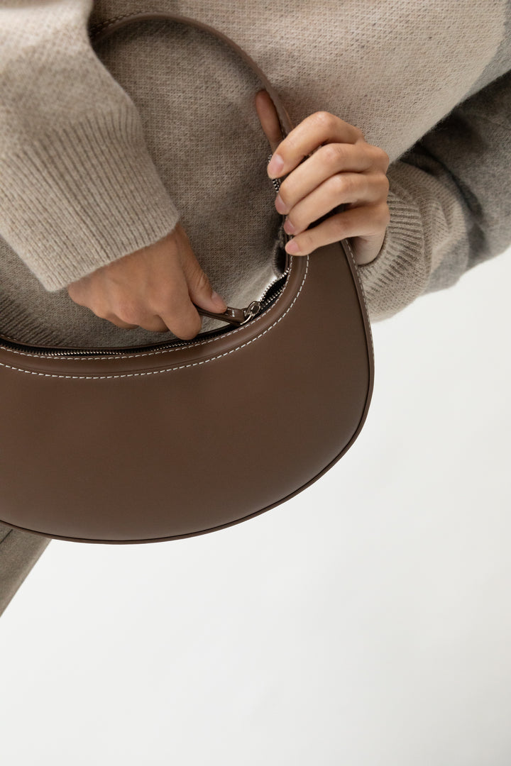 SMALL ROUND HAND BAG