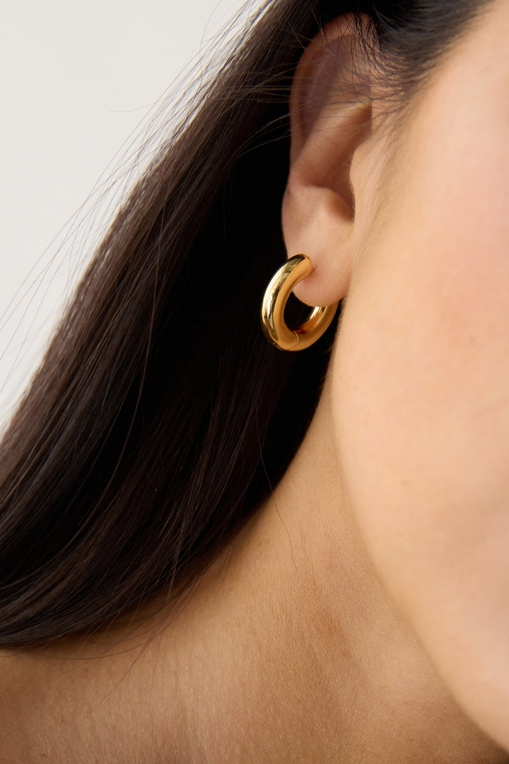 MINIMAL HUGGIE HOOP EARRINGS in Gold — alternate angle