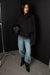 Short double-breasted funnel neck trench coat in black — main image