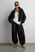 High funnel neck cropped drawstring jacket in black — main image