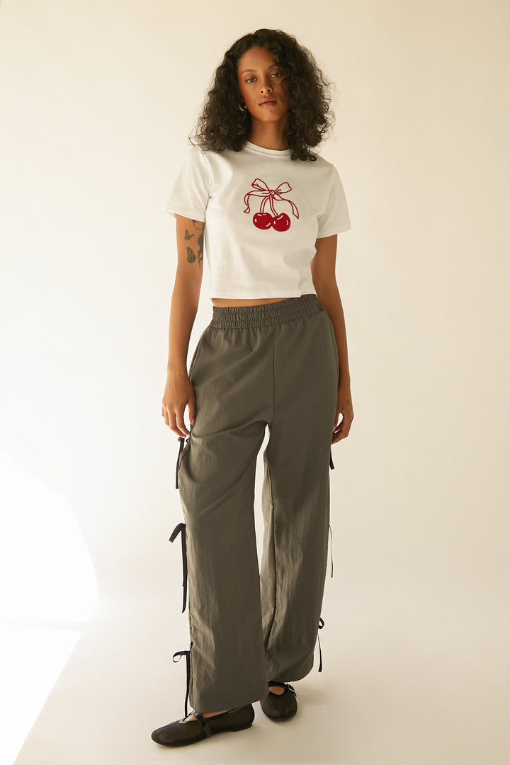 NYLON PANTS WITH BOWS