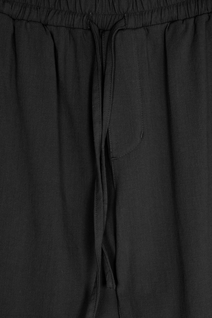 SLIM FIT PANTS in Black — alternate angle