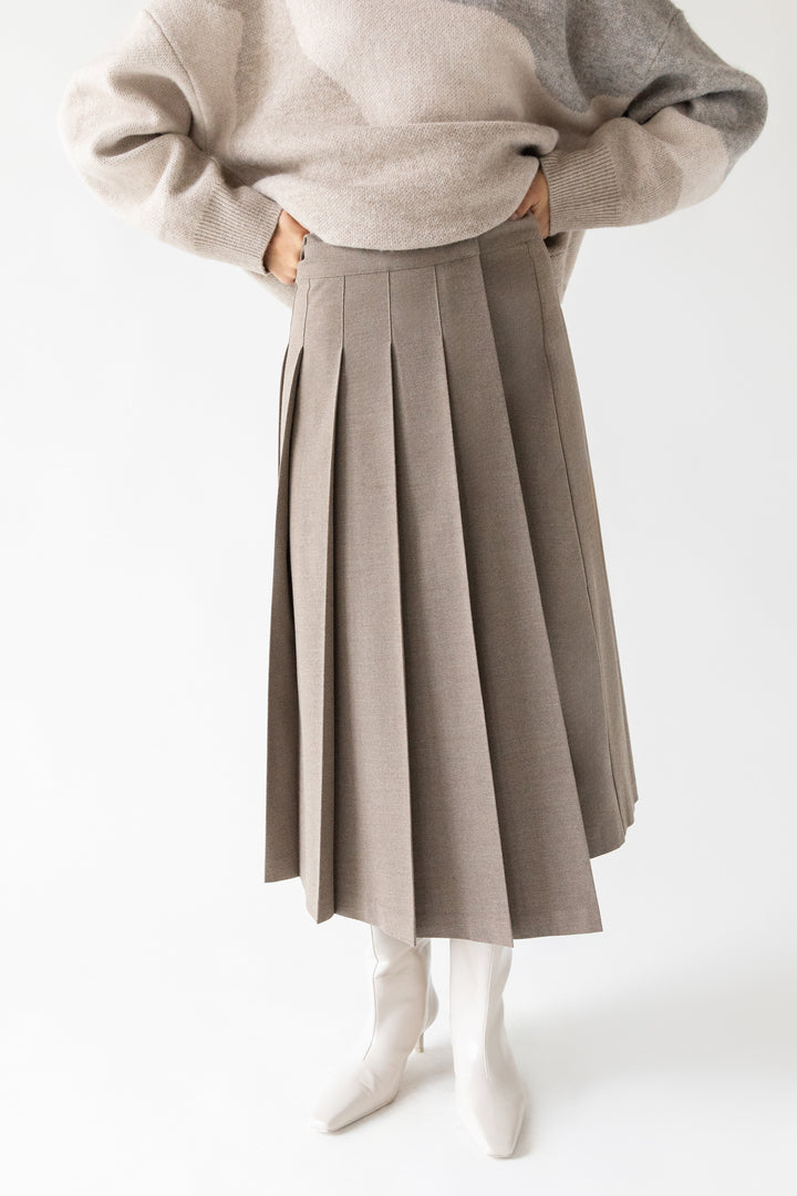 MIDI PLEATED ASYMMETRICAL SKIRT