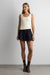 Mini canvas pleated skort in navy blazer — main image