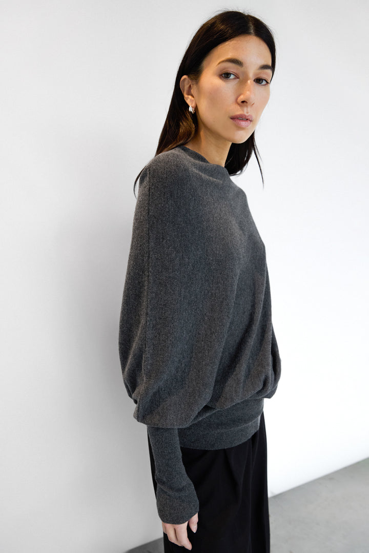 ASYMMETRICAL SWEATER WITH CUFFED SLEEVE