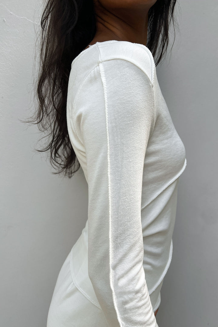 LONG SLEEVE TOP WITH ABSTRACT STITCHING in White — alternate angle